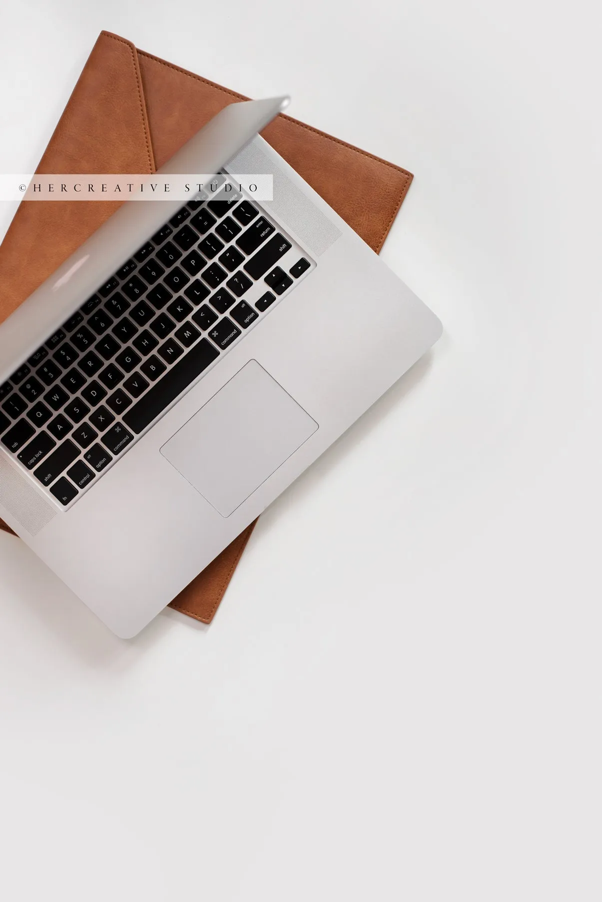 Laptop & Laptop Cover on White Backgorund. Digital Image.
